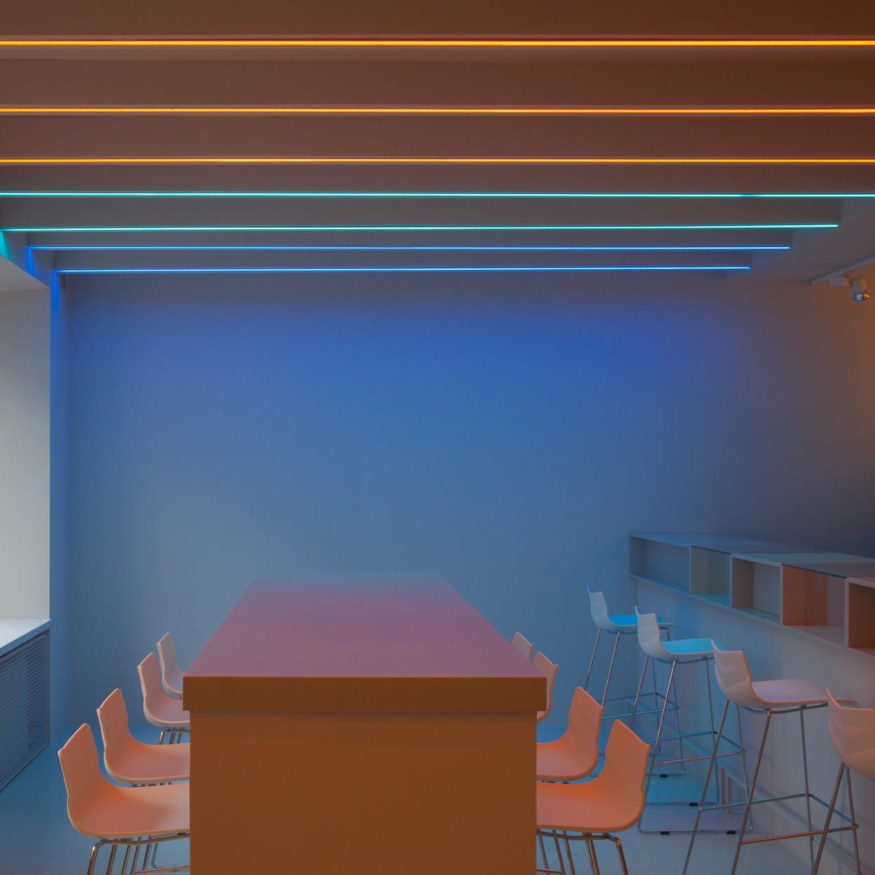 room with neon lights in pastel colors